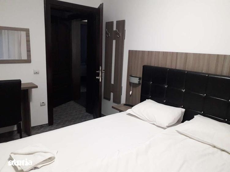Casă cu 10 camere cu Teren 360 Mp în Central