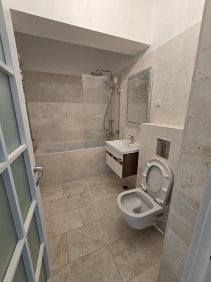 Apartament cu 2 camere semidecomandat în Liteni