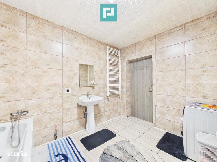 Casa P+E cu doua apartamente, zona Dragasani - 10