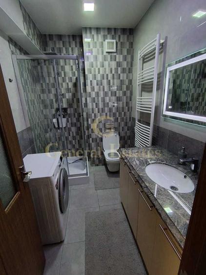 Apartament cu 3 camere decomandat în Tractorul