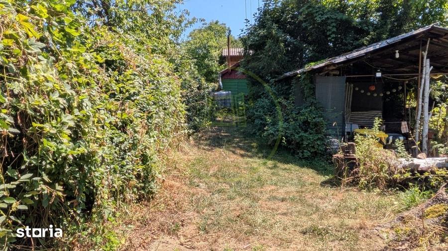 Teren intravilan cu poveste la Tocile - 1100 mp cu livada, cabana + ru - 3