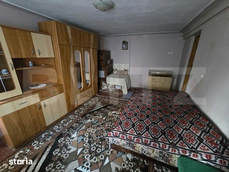 Casă cu 5 camere cu Teren 853 Mp în Șotânga