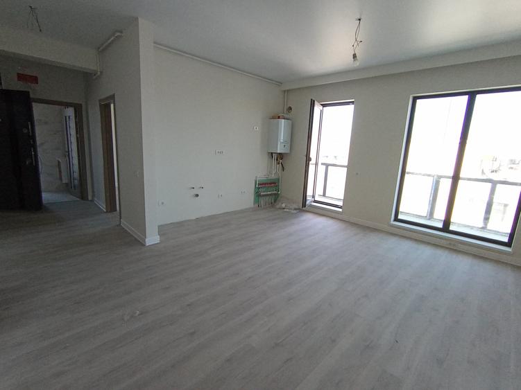 Exclusiv - Apartamente finalizate 2 camere și 3 camere -Loc parcare - 10