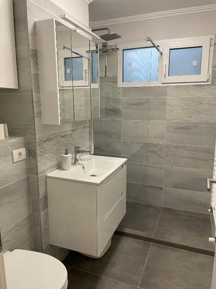 Apartament cu 2 camere semidecomandat, mobilat în Take Ionescu