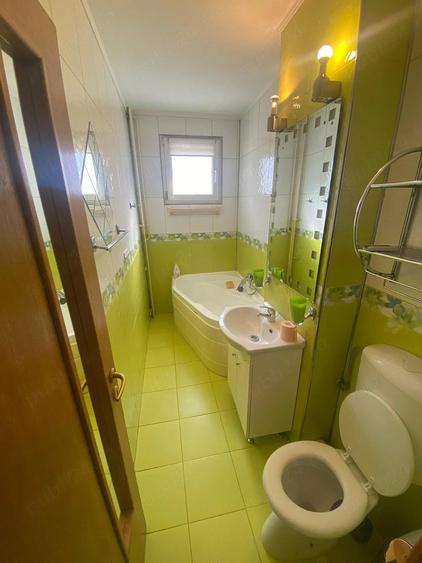 Apartament cu 4 camere decomandat în Ozana