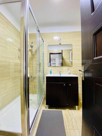 Apartament cu 2 camere semidecomandat, mobilat în Central
