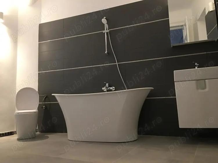 Apartament cu 4 camere decomandat în Central