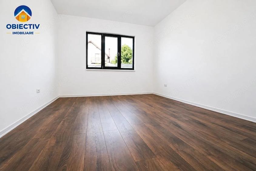Casă cu Teren 500 Mp în Est