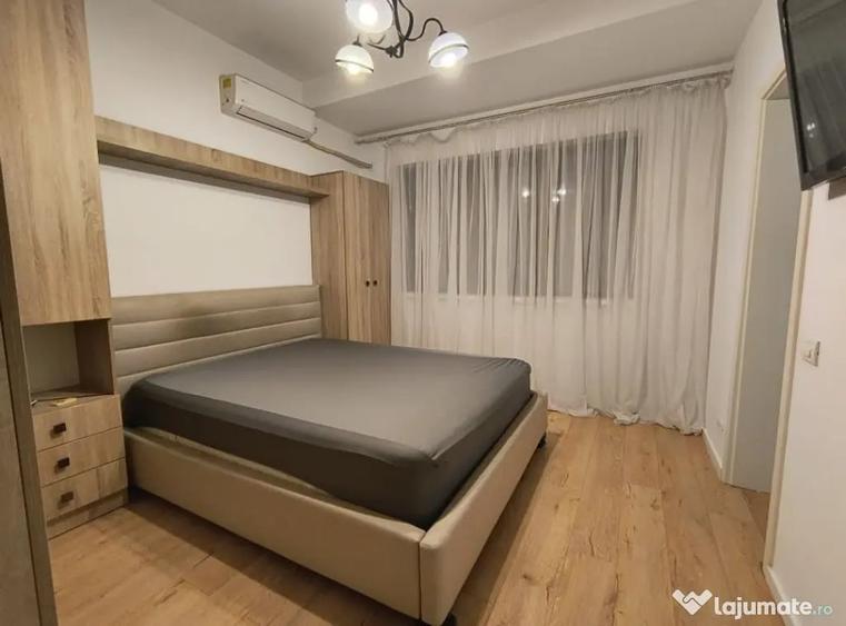 Apartament cu 3 camere semidecomandat în 1 Mai