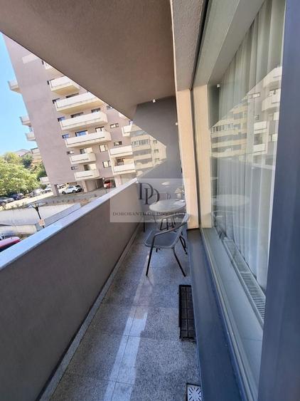 Apartament cu 2 camere semidecomandat, mobilat în Central