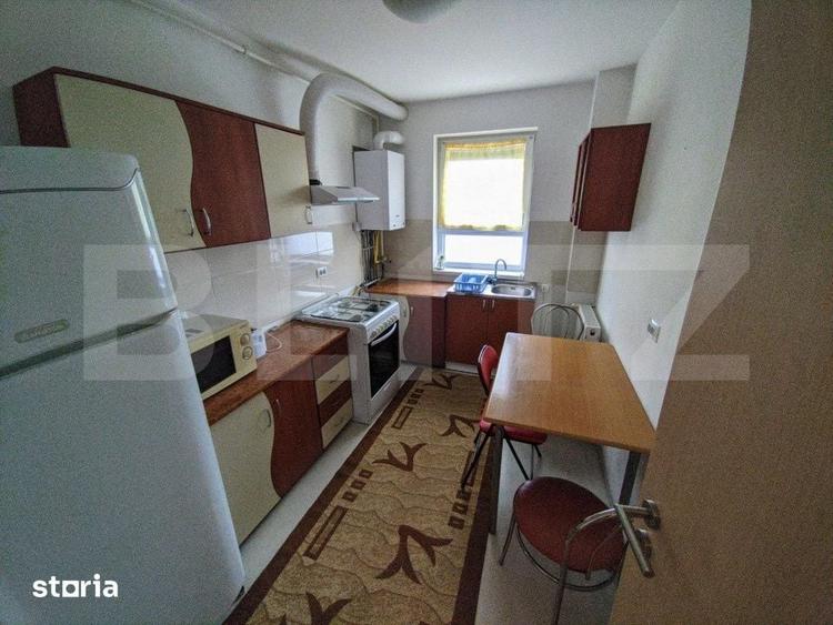 Apartament cu 3 camere decomandat în Tractorul