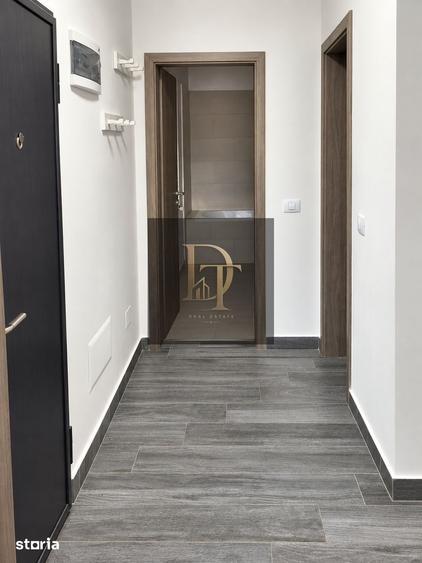 Apartament cu 3 camere decomandat în Tractorul