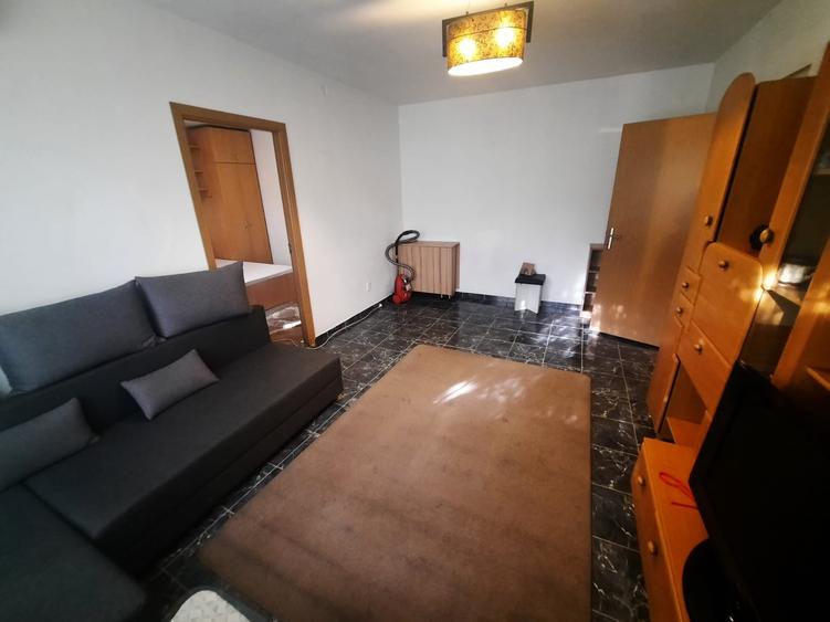 Apartament cu 2 camere nedecomandat, mobilat în Podu Roș
