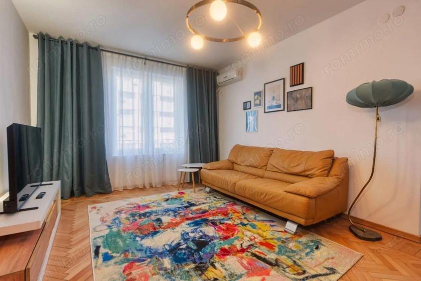 Apartament cu 3 camere semidecomandat în Romană