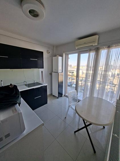 Apartament cu 2 camere semidecomandat, mobilat în Bună Ziua