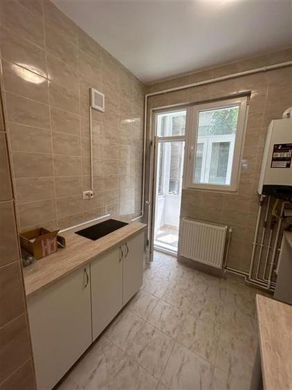 Apartament cu 3 camere decomandat în Magheru