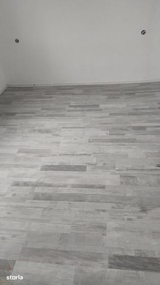 Casă cu 4 camere cu Teren 200 Mp în Central