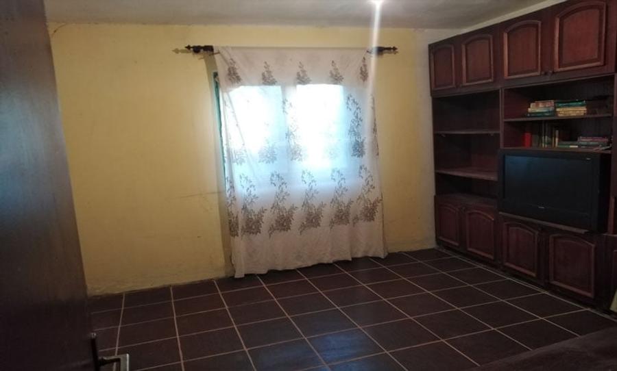 Casă individuală cu 5 camere cu Teren 409 Mp în Central