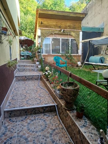 Casă cu 4 camere cu Teren 1000 Mp în Central