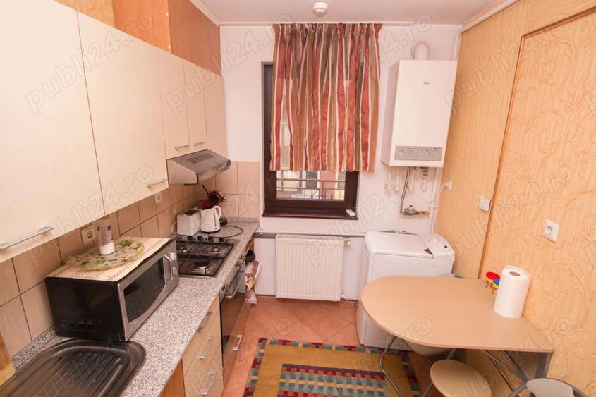 Apartament cu 2 camere semidecomandat, mobilat în Central
