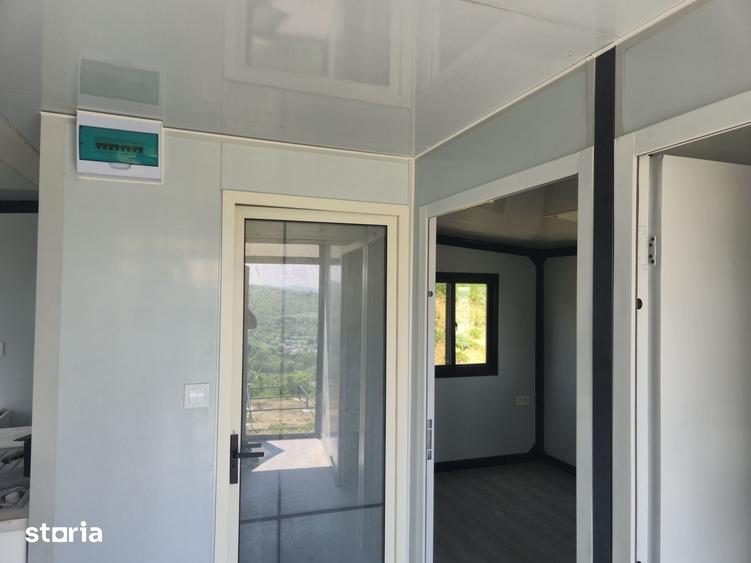 Casă cu 2 camere cu Teren 450 Mp în Tomești