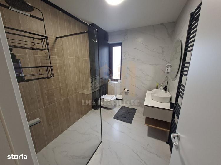 Apartament cu 2 camere decomandat în Poiana Brașov