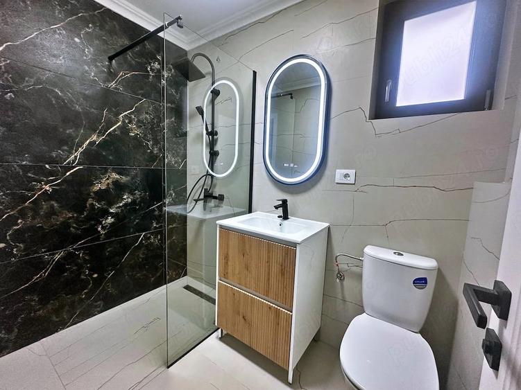 Casă cu 5 camere cu Teren 500 Mp în Căpățânești