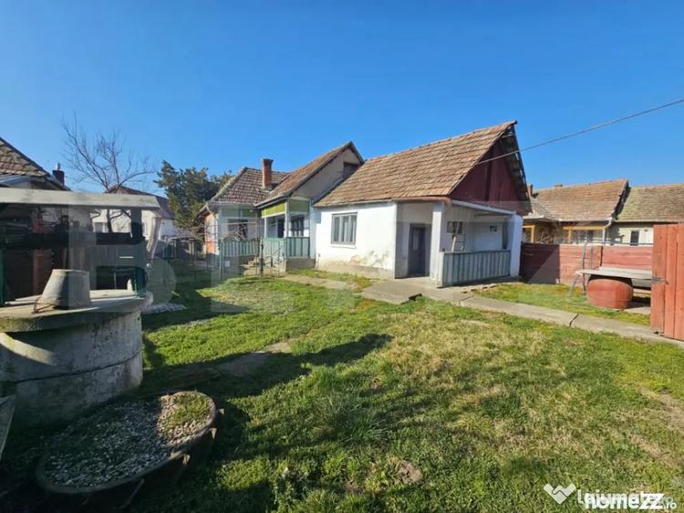 Casă cu 4 camere cu Teren 1000 Mp în Sâncel