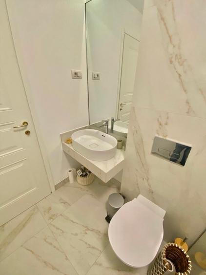 Apartament cu 3 camere decomandat, mobilat în Calea Victoriei