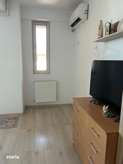 1 dormitor, sufragerie, baie= 42mp + bucatarie in balcon inchis. - 4