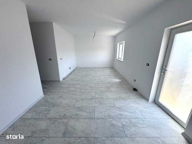 Casă cu 4 camere în Tomești