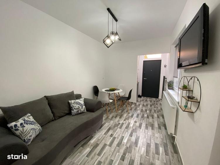 Apartament cu 2 camere, mobilat în Central