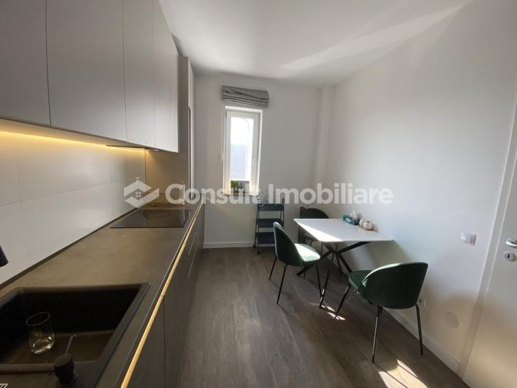 Apartament cu 2 camere semidecomandat, mobilat în Chinteni