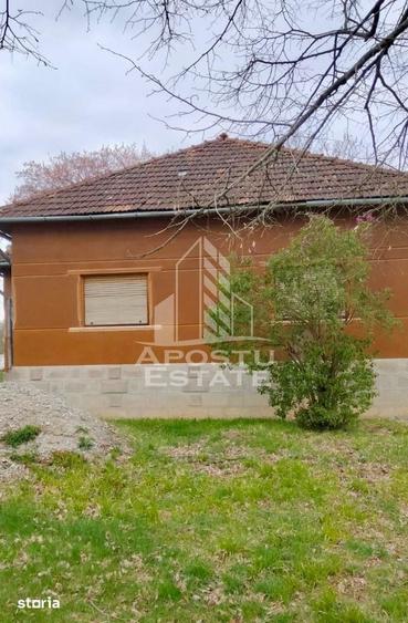Casă cu 4 camere cu Teren 1079 Mp în Vârfurile