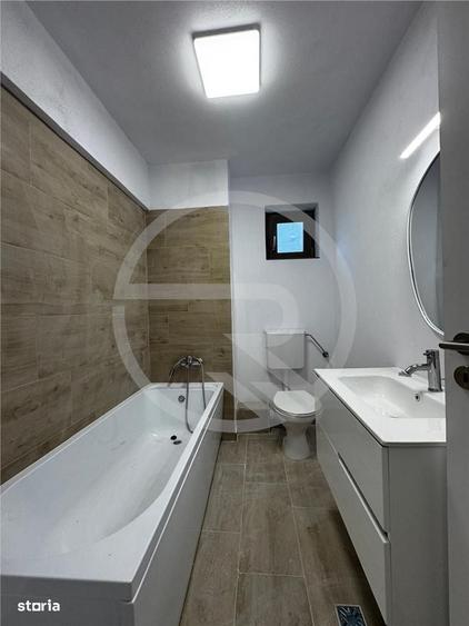 Apartament cu 3 camere semidecomandat în Borhanci