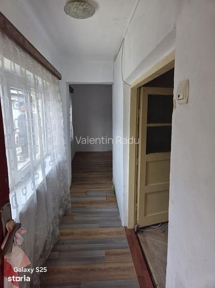 Casa cu 4 camere, teren 236 mp, acces asfaltat