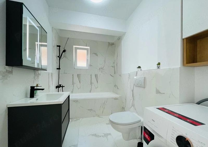 Apartament cu 2 camere semidecomandat, mobilat în Florești