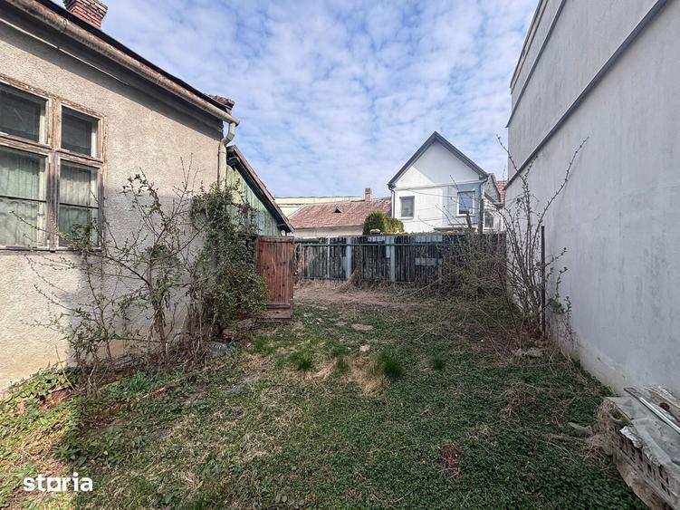 Casă cu 4 camere decomandat cu Teren 450 Mp în Budai