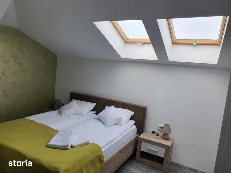 Casă cu 7 camere cu Teren 1500 Mp în Sânmartin