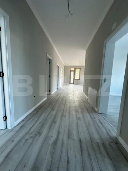 Casă cu 4 camere cu Teren 500 Mp în Central