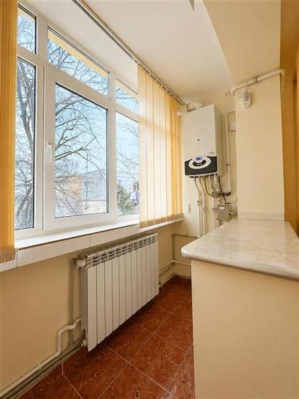 Apartament cu 4 camere semidecomandat în Spitalului