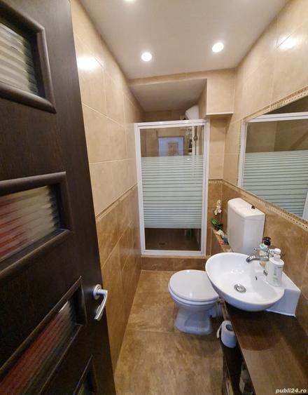 Apartament cu 4 camere decomandat în Tractorul