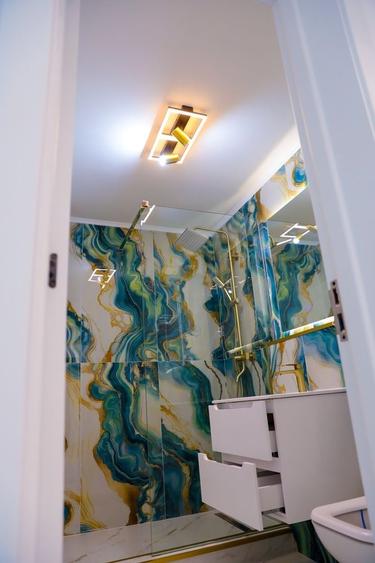 Apartament cu 4 camere decomandat în Central