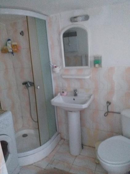 Casă cu 7 camere cu Teren 1000 Mp în Central