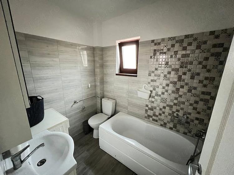 Apartament cu 3 camere semidecomandat în Giarmata