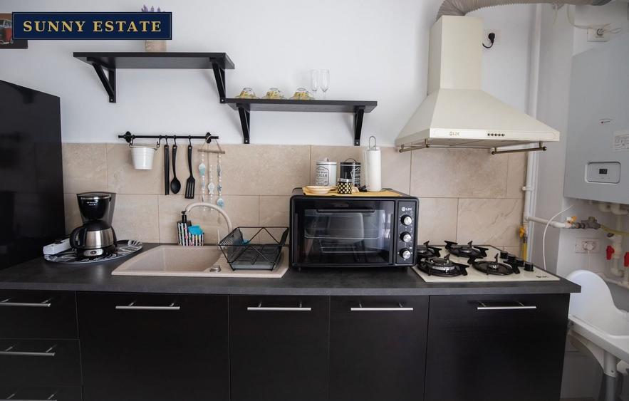 Apartament cu 2 camere semidecomandat, mobilat în Central