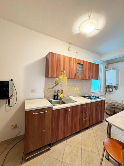 Apartament cu 2 camere semidecomandat, mobilat în Central