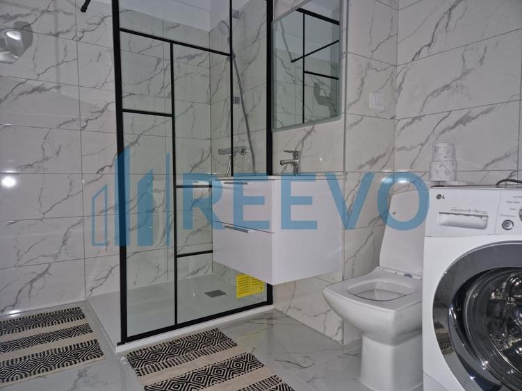 Apartament cu 2 camere semidecomandat, mobilat în Calea Moldovei