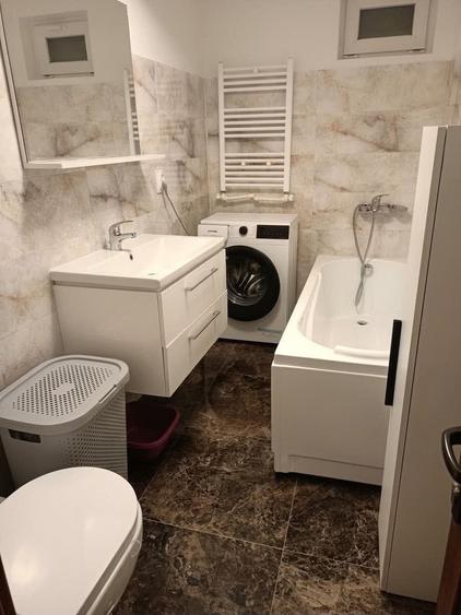 Apartament cu 3 camere semidecomandat în Vișan