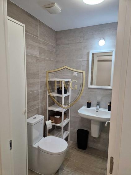 Apartament cu 2 camere semidecomandat, mobilat în Costin Georgian